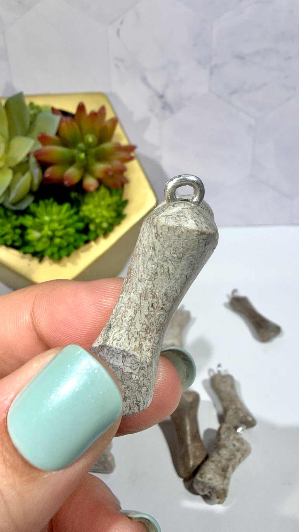 Genuine Dinosaur Bone Pendant "Atlasaurus imelakai"