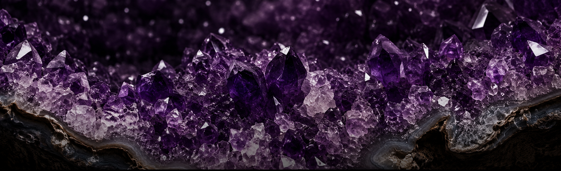 Close-up of purple crystals on a dark background